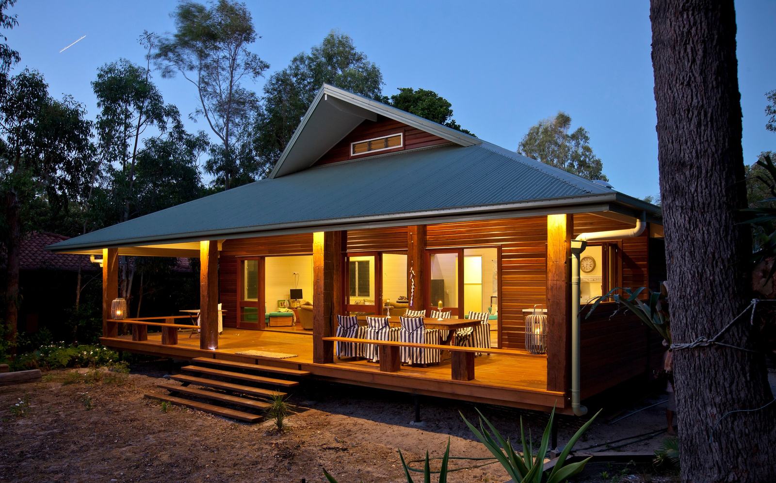 Renovated timber home with a lit entertaining deck